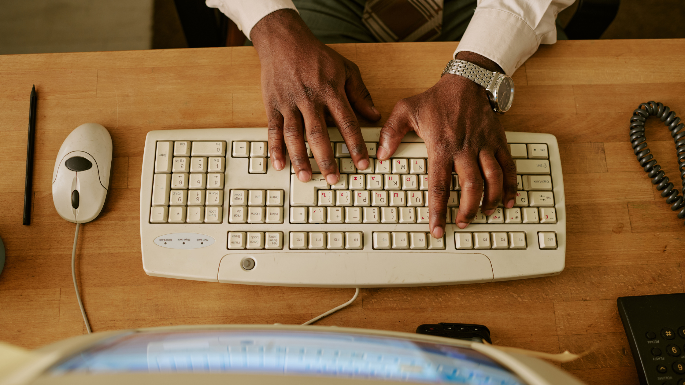 Man searching on computer to optimize Costs with AWS Spot Instances